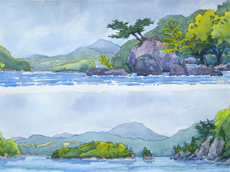 Views from the water of distant islands and hills beyond.